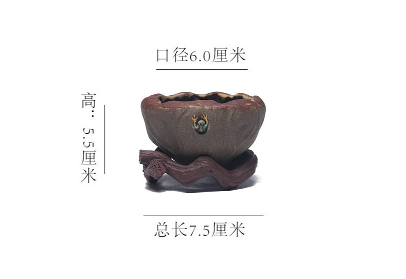 This is a Yixing tea filter.this is Chinese yixing clay tea funnel