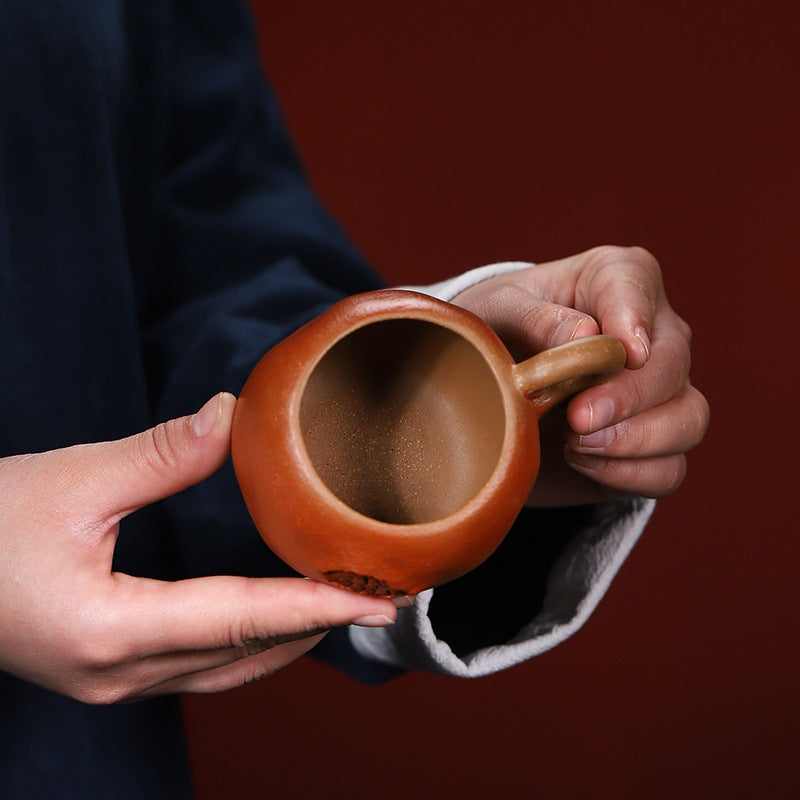 this is a Yixing teacup.this is Chinese Yixing clay teacup