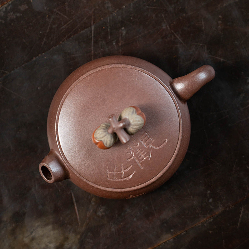 This is a Yixing teapot. this is Chinese yixing clay teapot