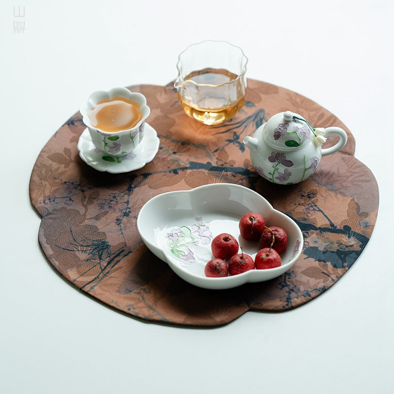 this is a ceramic teapot