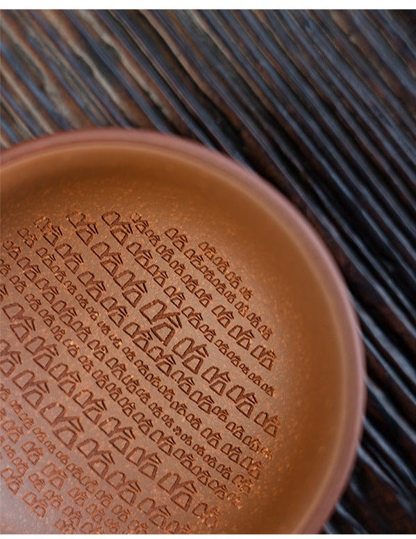 this is a Yixing teacup.this is Chinese Yixing clay teacup