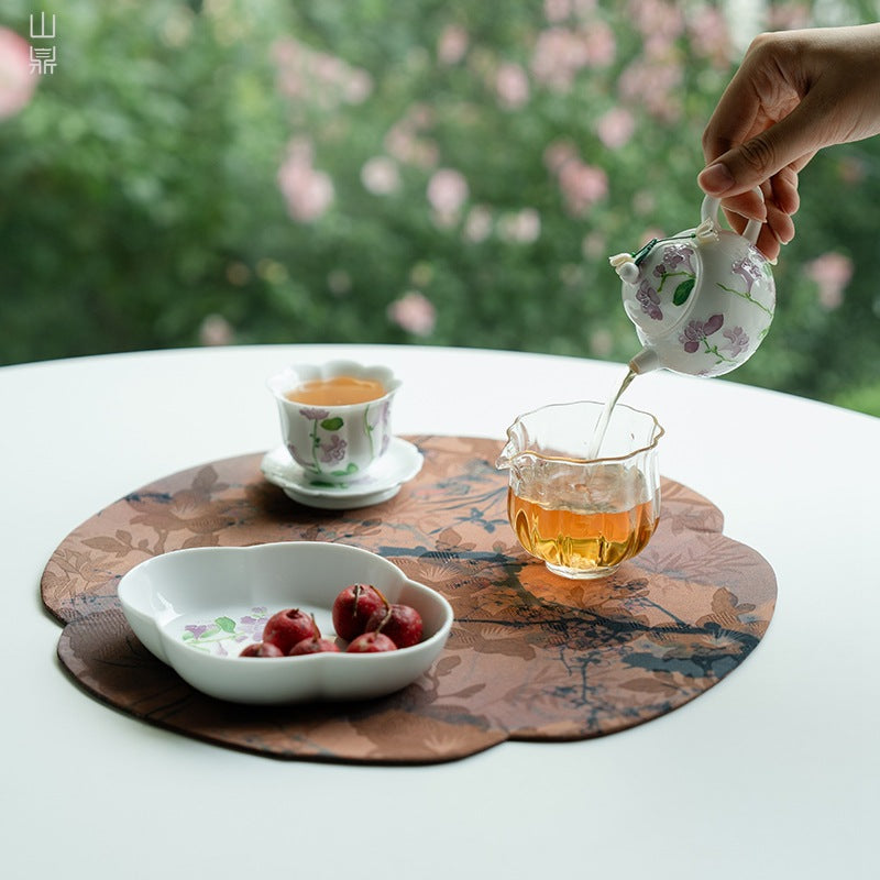 this is a ceramic teapot