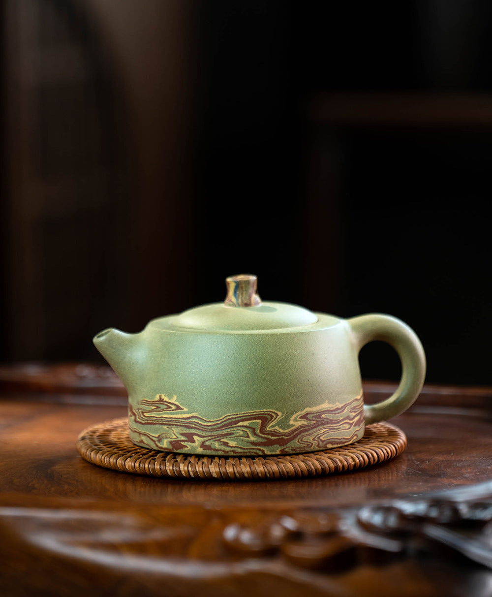 This is a Yixing teapot. this is Chinese yixing clay teapot