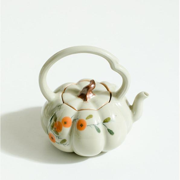 this is a ceramic teapot
