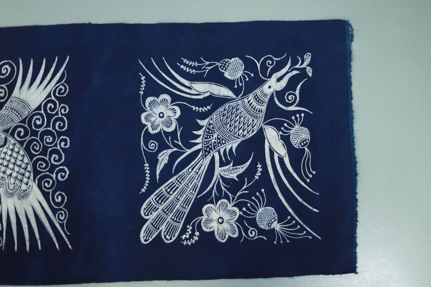 This is a Chinese Miao style batik table cloth tea mat
