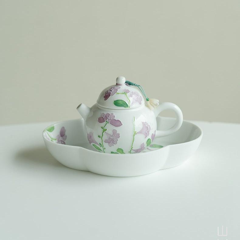 this is a ceramic teapot