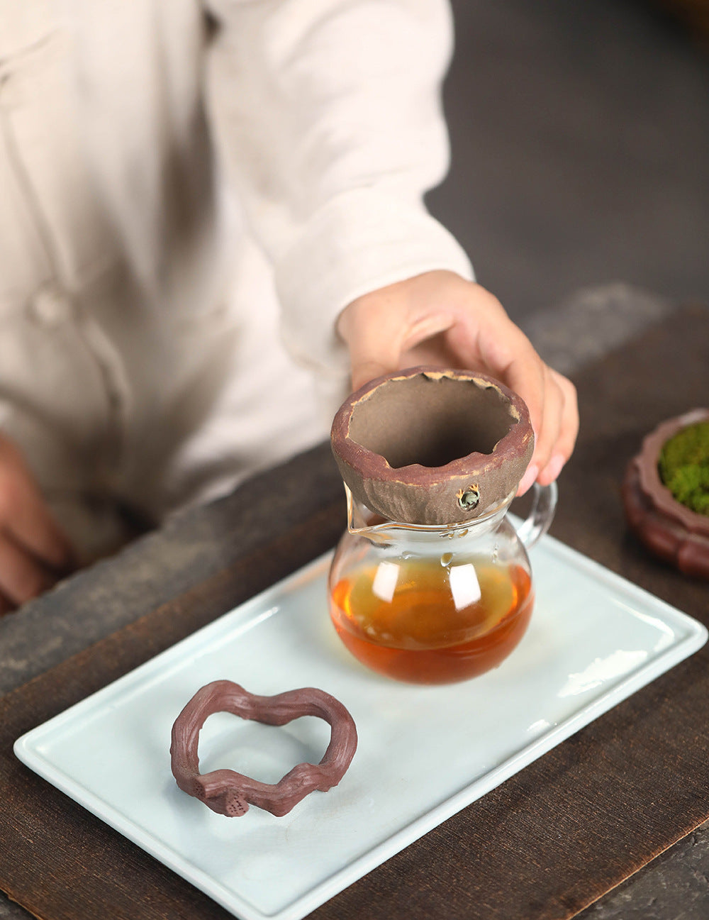 This is a Yixing tea filter.this is Chinese yixing clay tea funnel