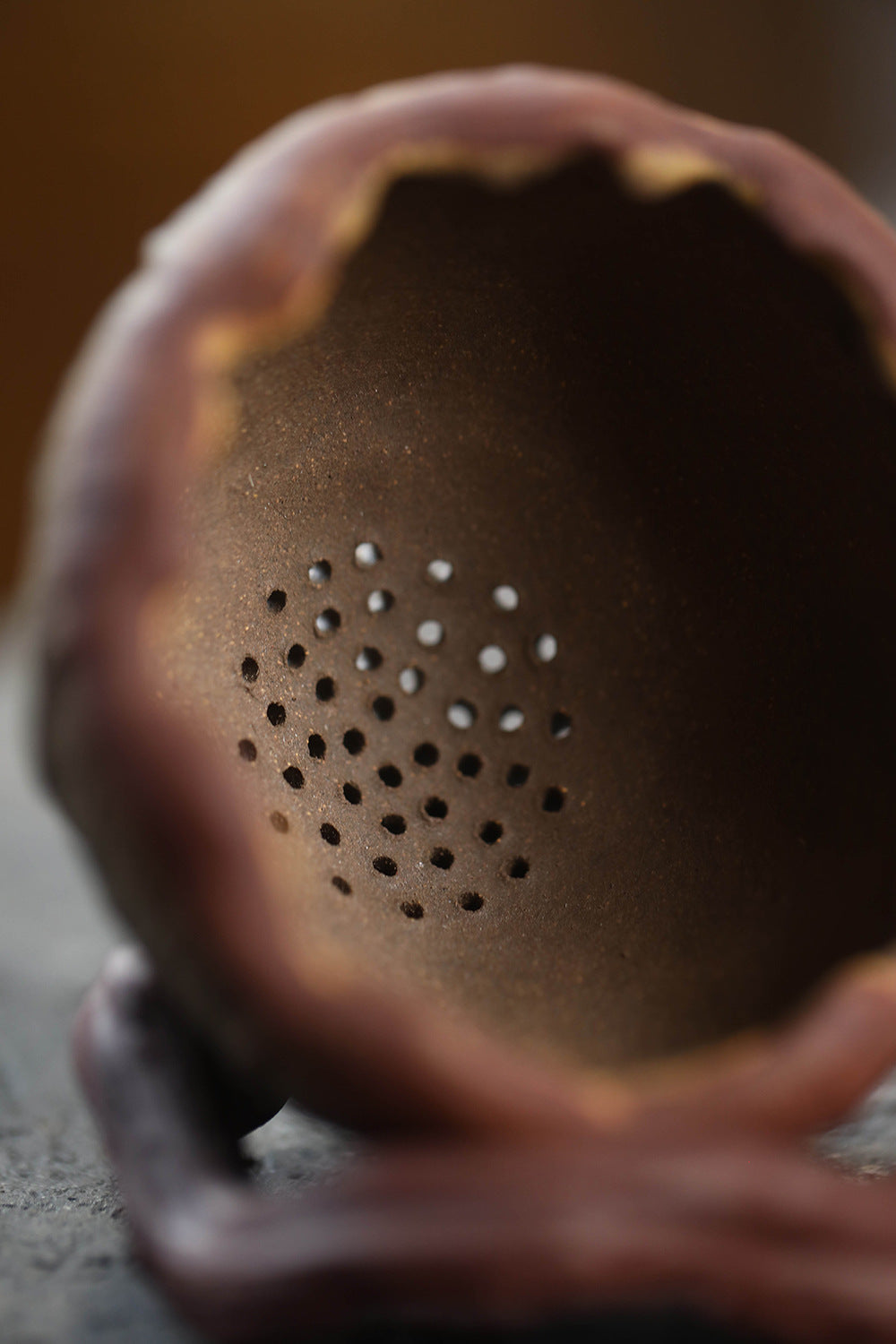This is a Yixing tea filter.this is Chinese yixing clay tea funnel