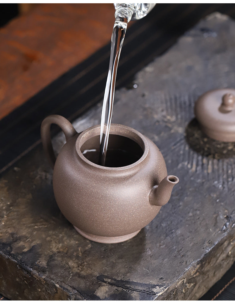 This is a Yixing teapot. this is Chinese yixing clay teapot