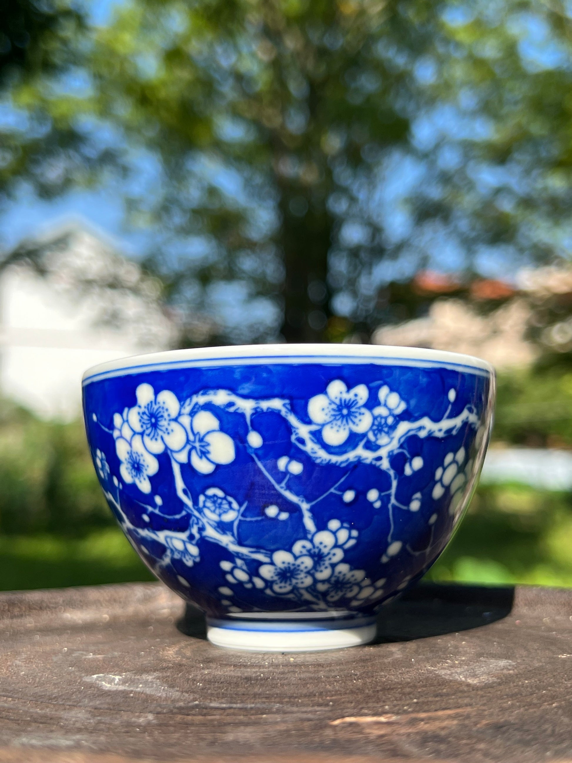 This is Chinese Jingdezhen blue and white porcelain gaiwan. This is a ceramic plum flower teapot