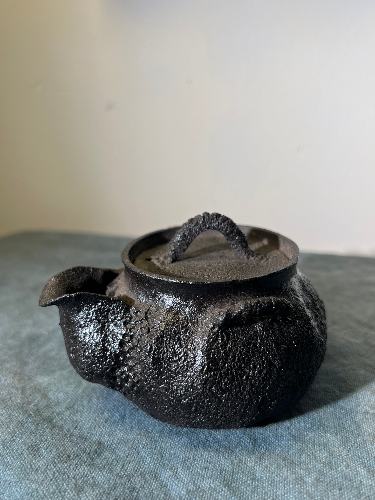 This is a purple clay teapot