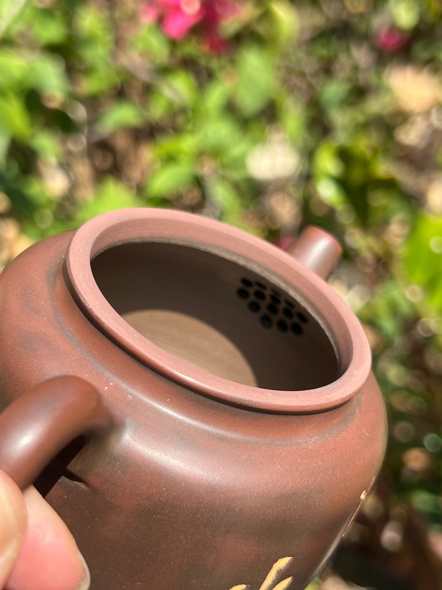 This is a Nixing clay teapot.this is a Chinese Nixing pottery teapot