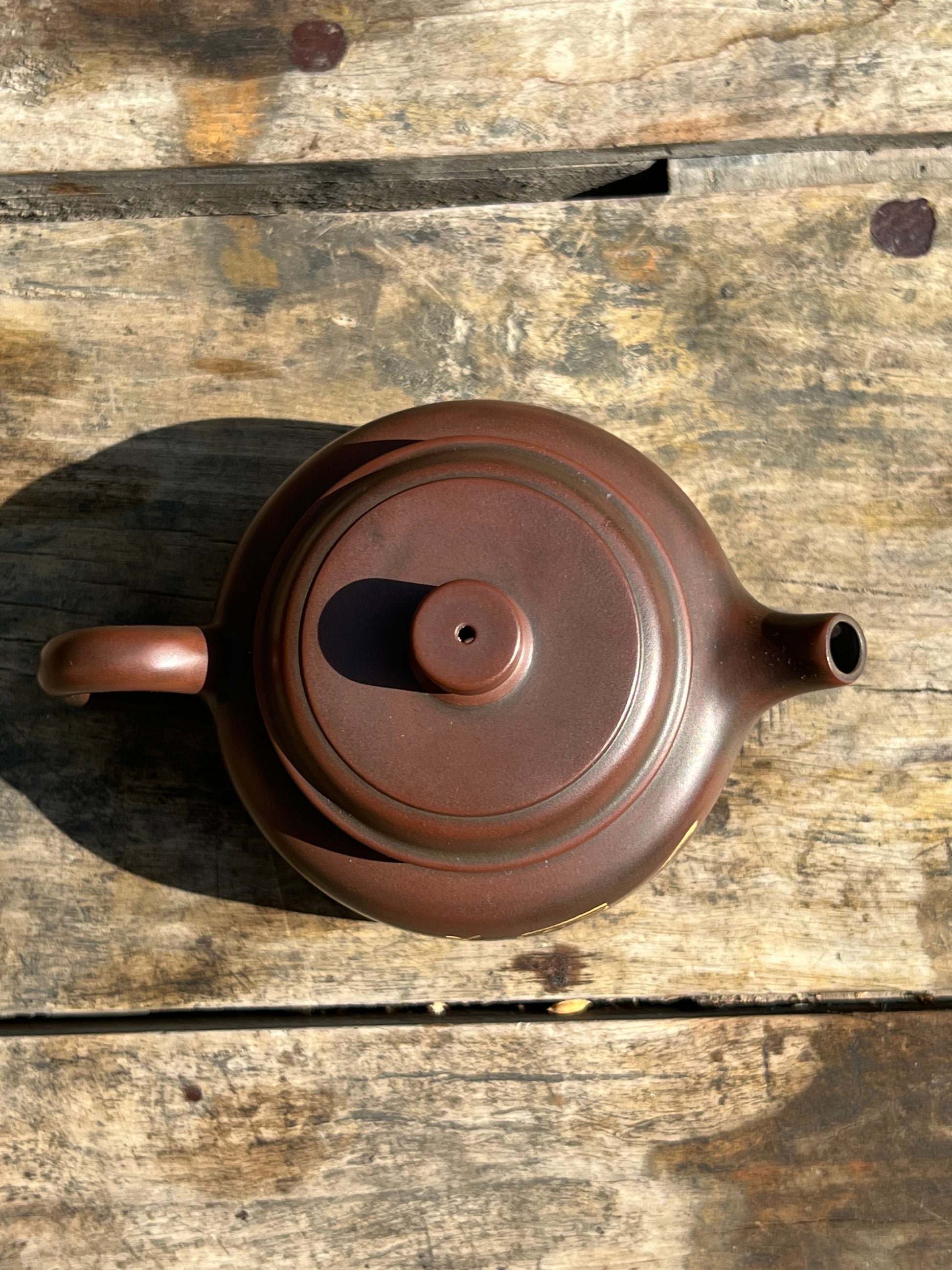 This is a Nixing clay teapot.this is a Chinese Nixing pottery teapot