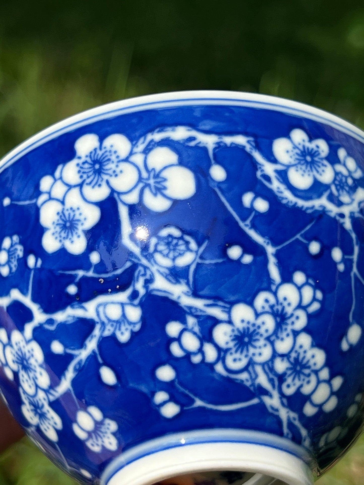 This is Chinese Jingdezhen blue and white porcelain gaiwan. This is a ceramic plum flower teapot