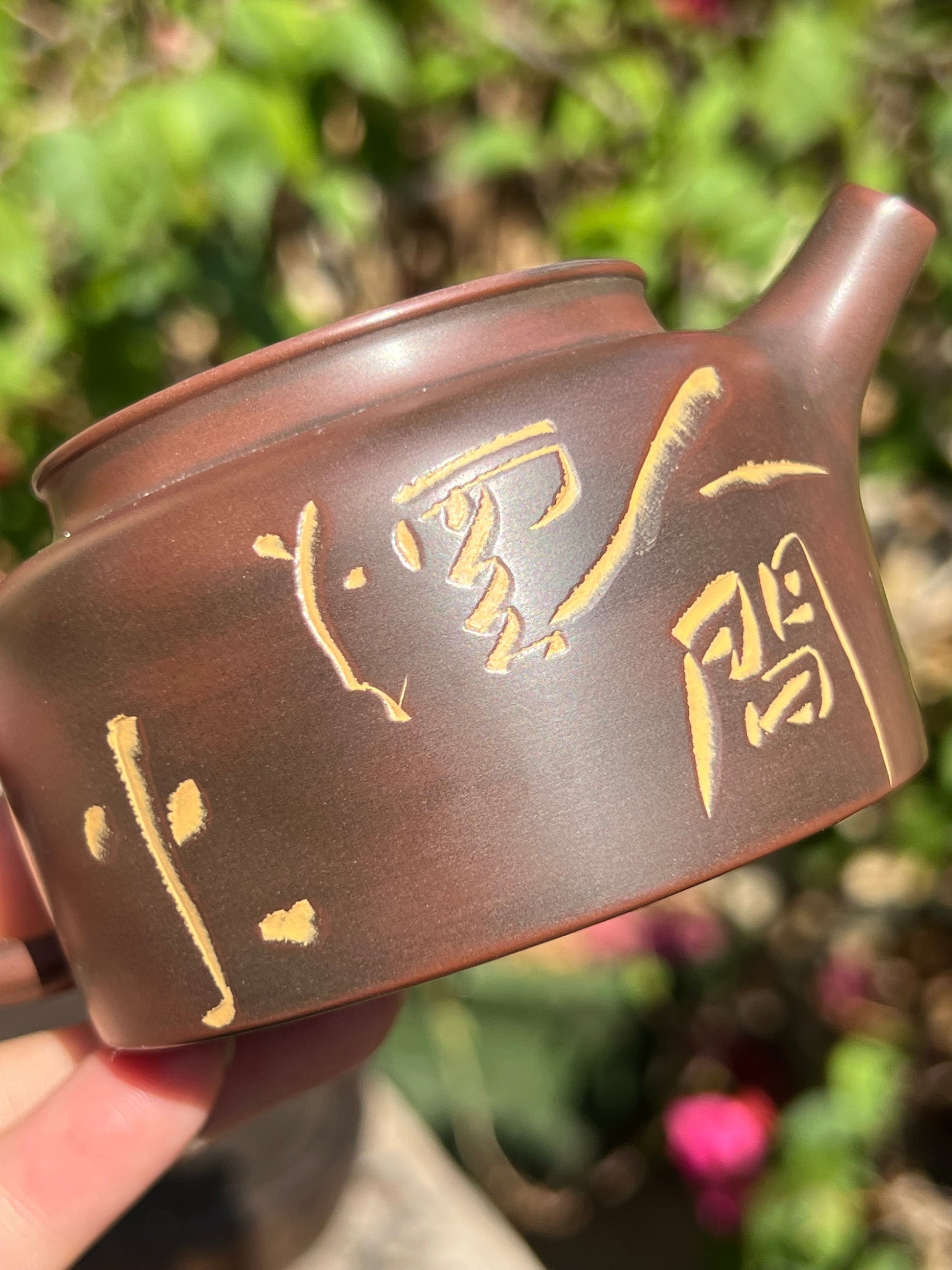 This is a Nixing clay teapot.this is a Chinese Nixing pottery teapot