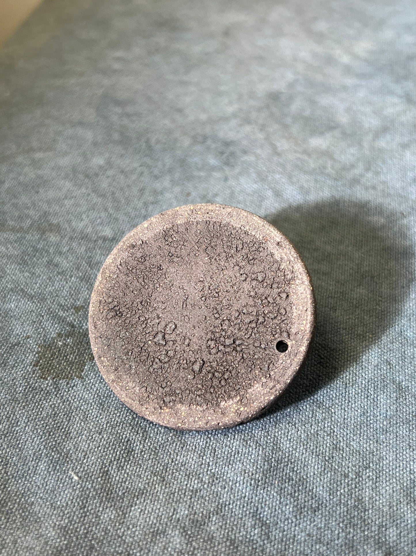 This is a purple clay teapot