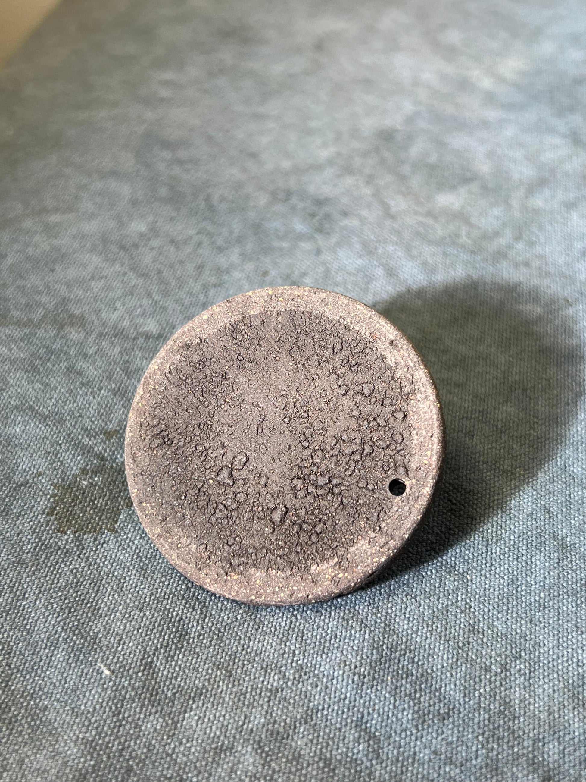 This is a purple clay teapot