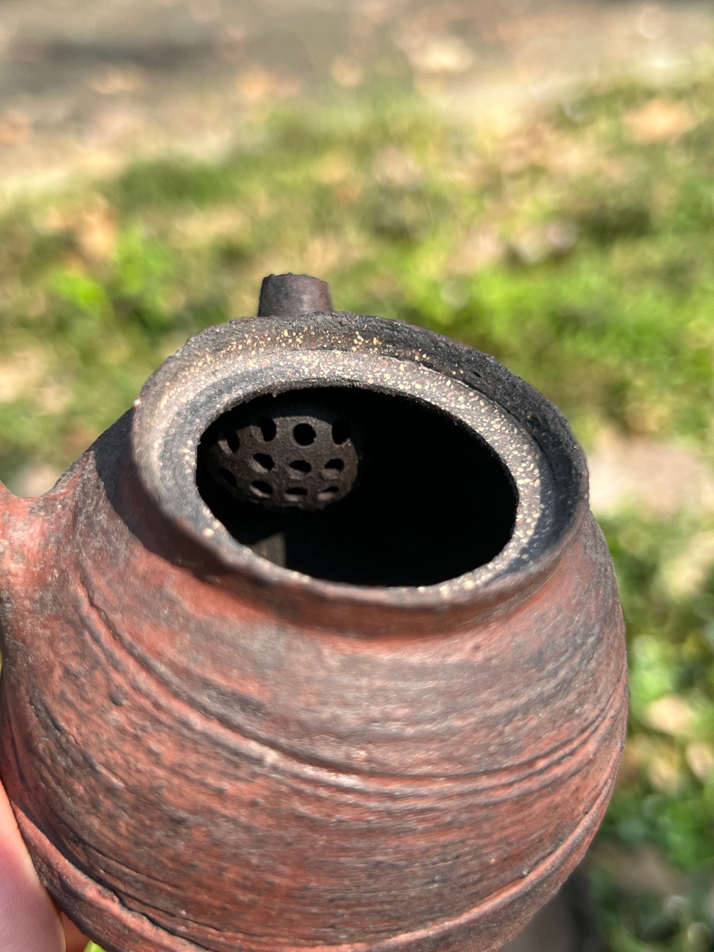 This is a pottery teapot