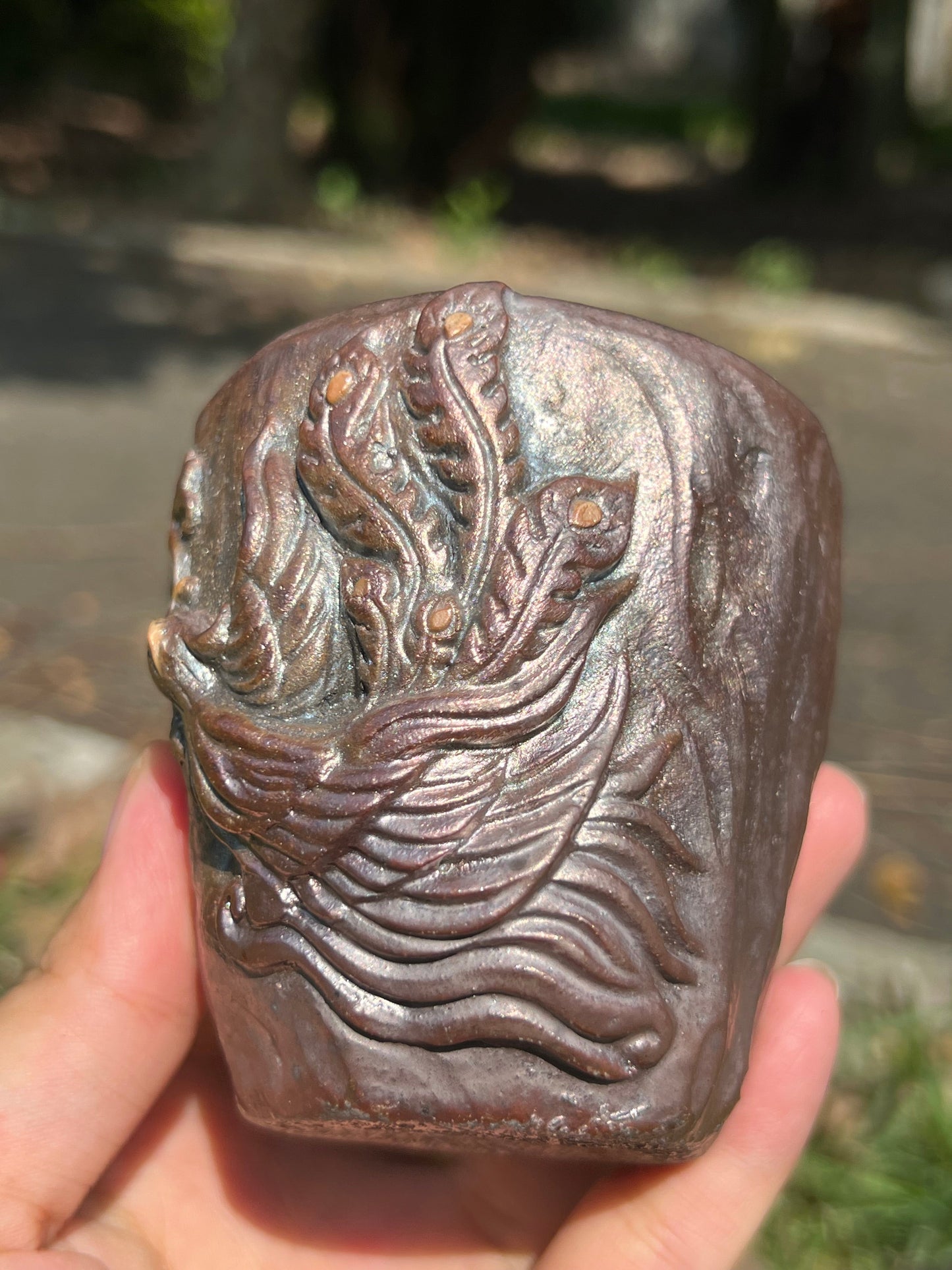 This is a woodfired tietai pottery phoenix teacup