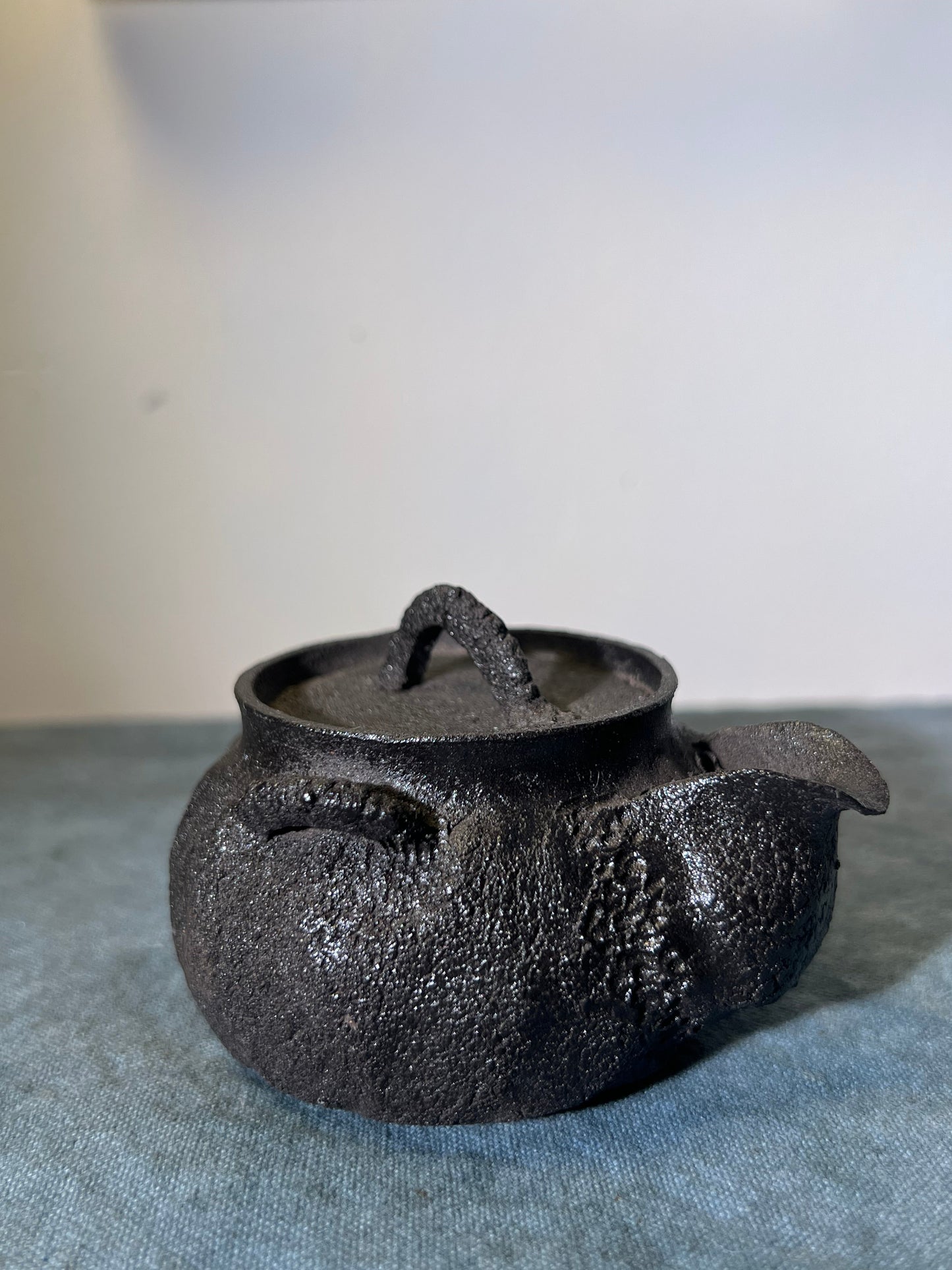 This is a purple clay teapot