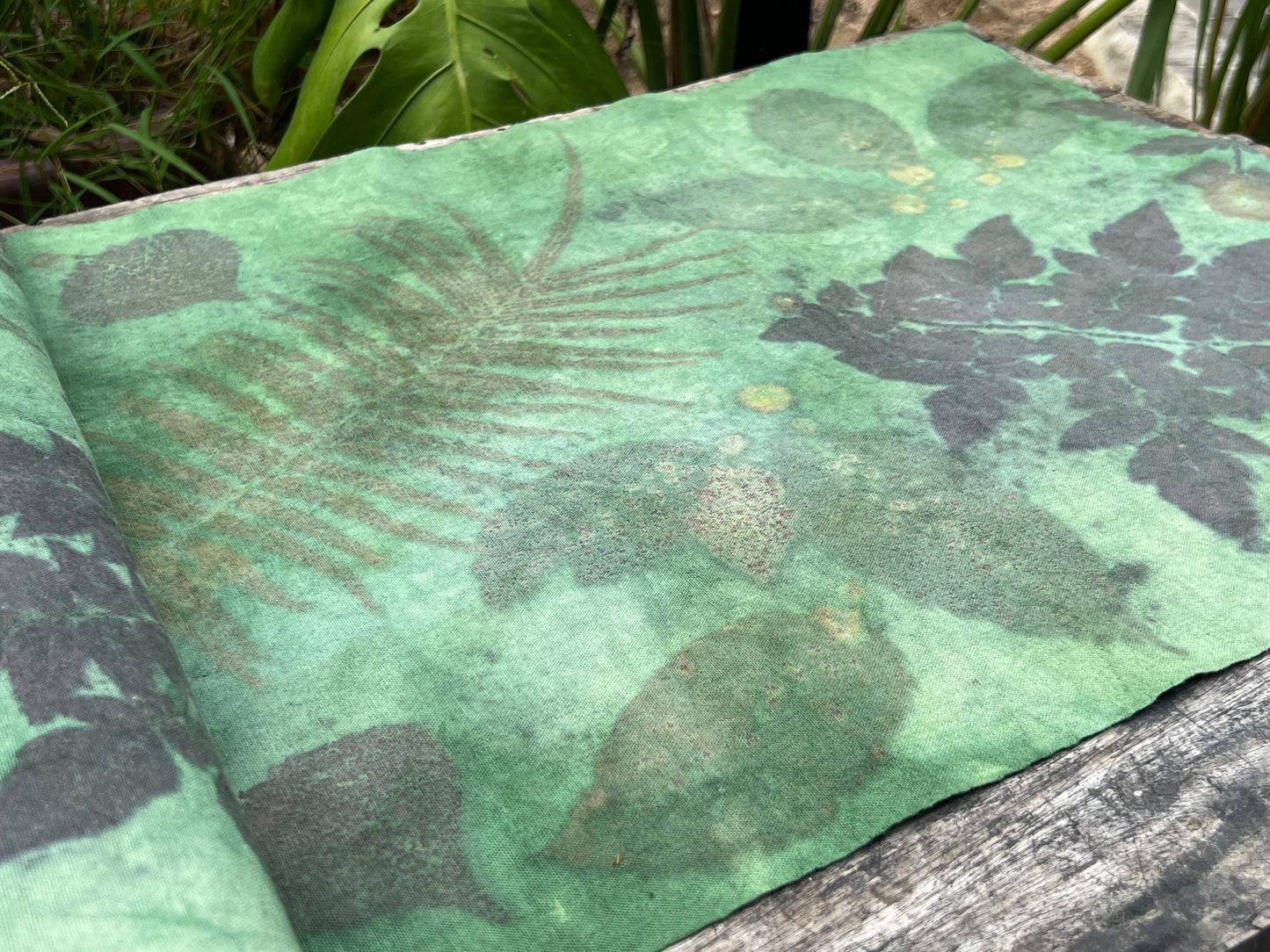 This is a plant dyed tea mat table cloth