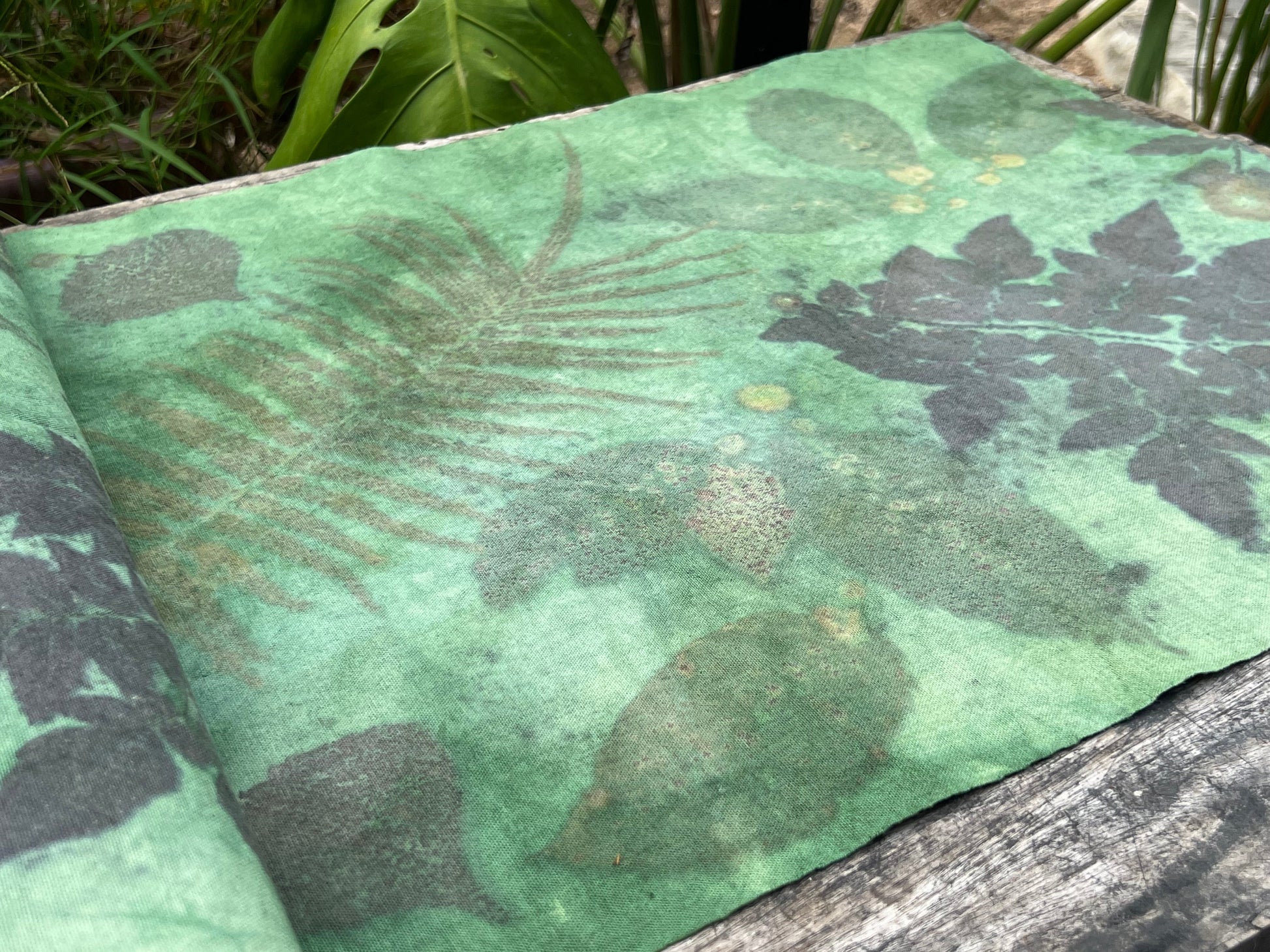 This is a plant dyed tea mat table cloth