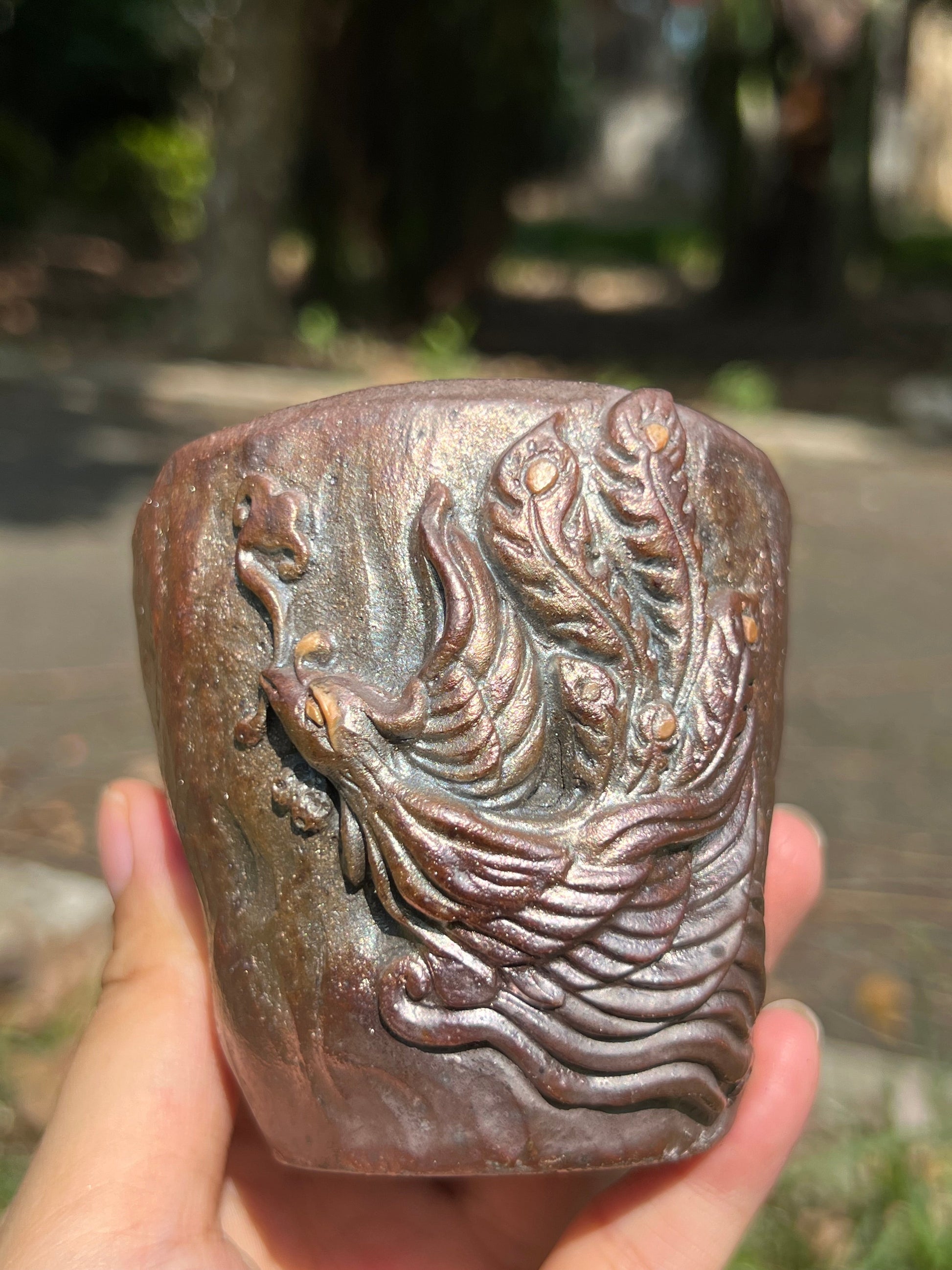 This is a woodfired tietai pottery phoenix  teacup