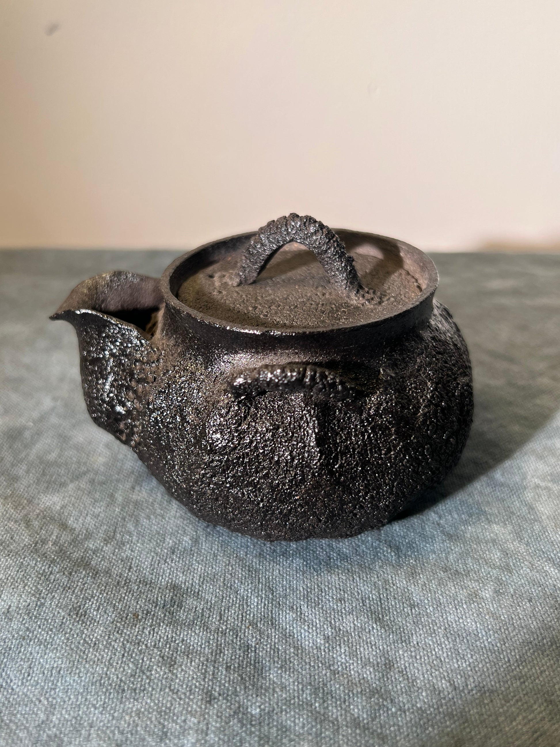 This is a purple clay teapot