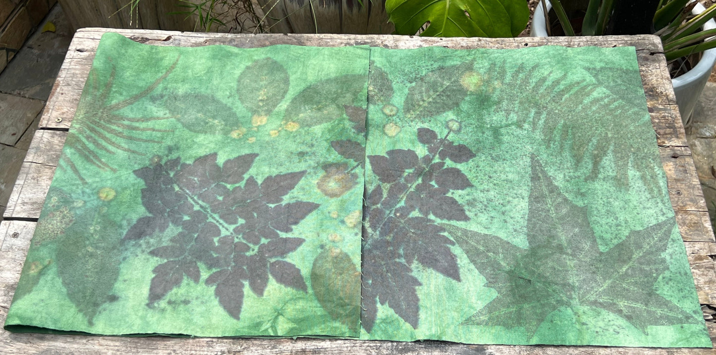 This is a plant dyed tea mat table cloth