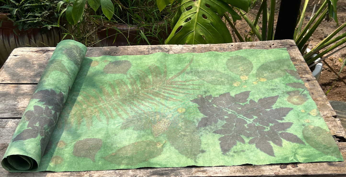 This is a plant dyed tea mat table cloth