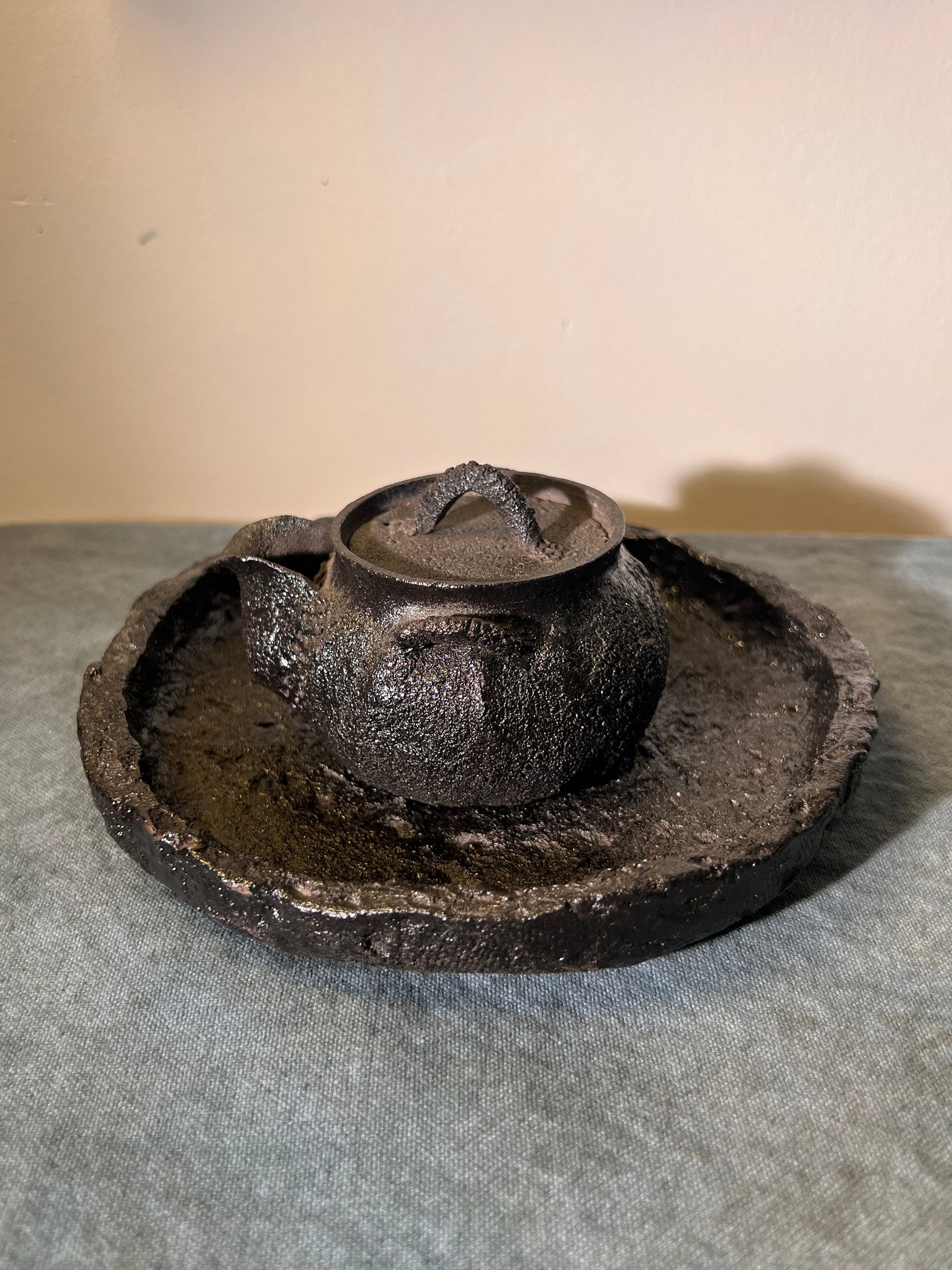 This is a purple clay teapot