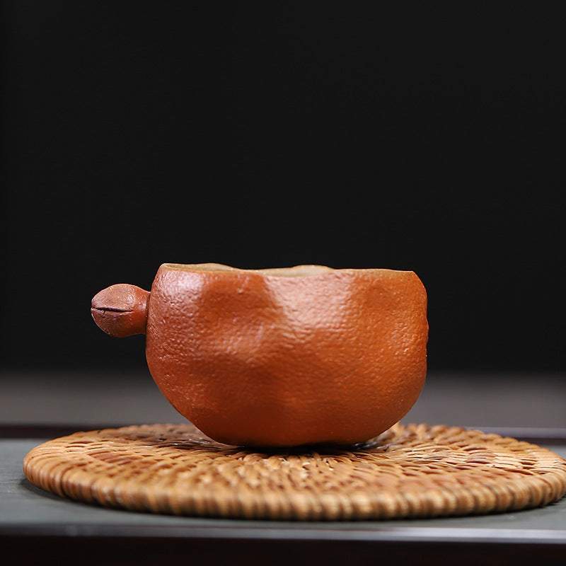 this is a Yixing teacup.this is Chinese Yixing clay teacup