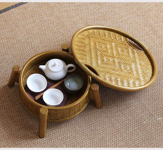 This is a bamboo weaving storage tea box.this is a yellow tea table