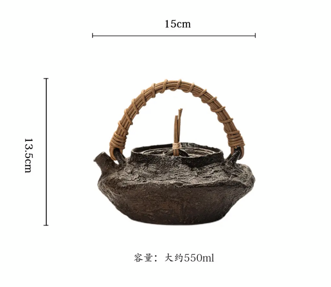 This is a pottery lifting handle kettle
