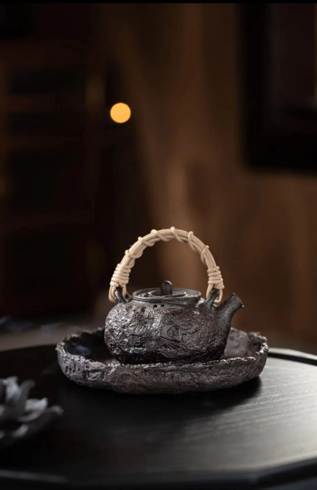 This is a pottery lifting handle kettle