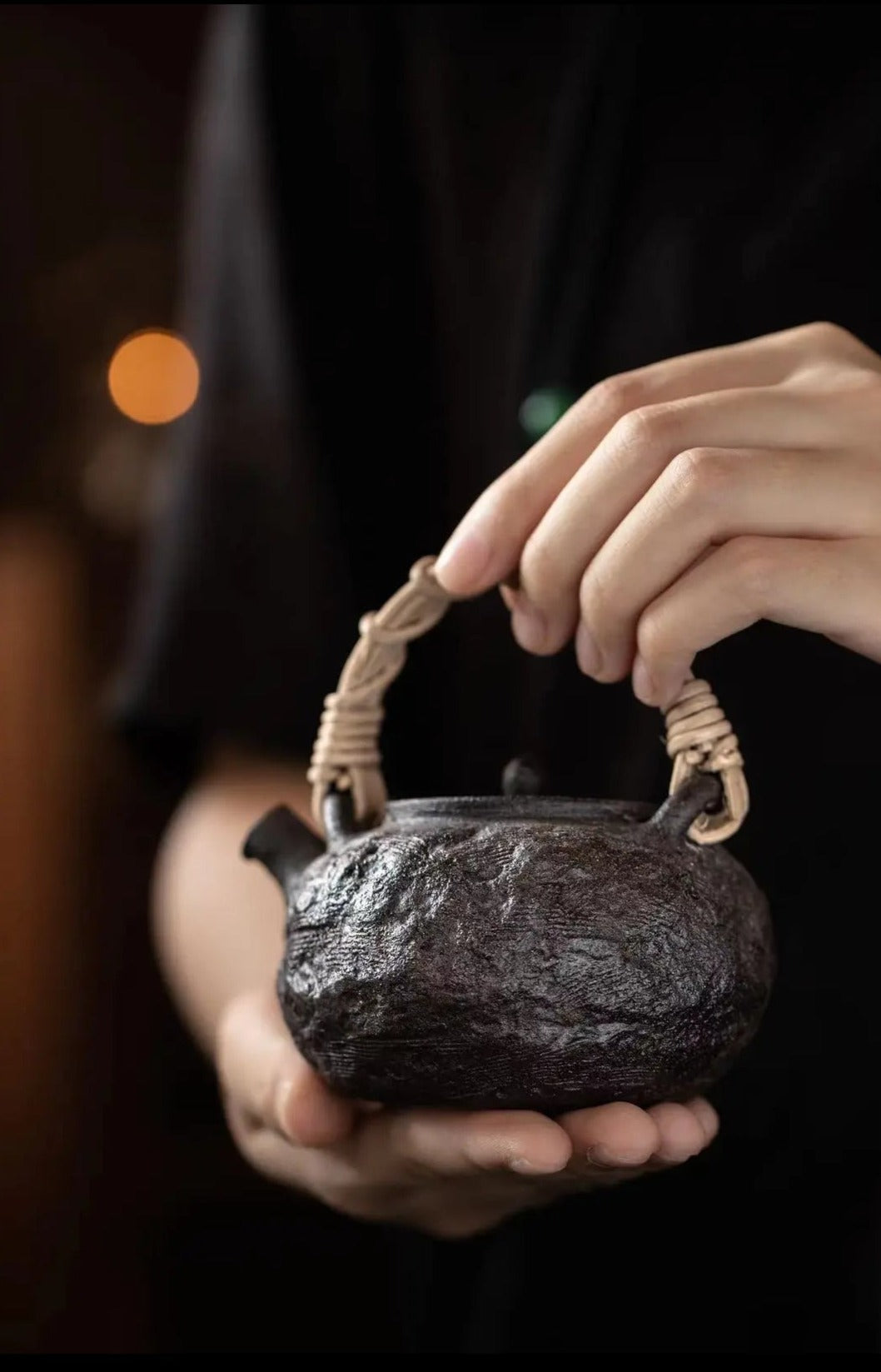 This is a pottery lifting handle kettle