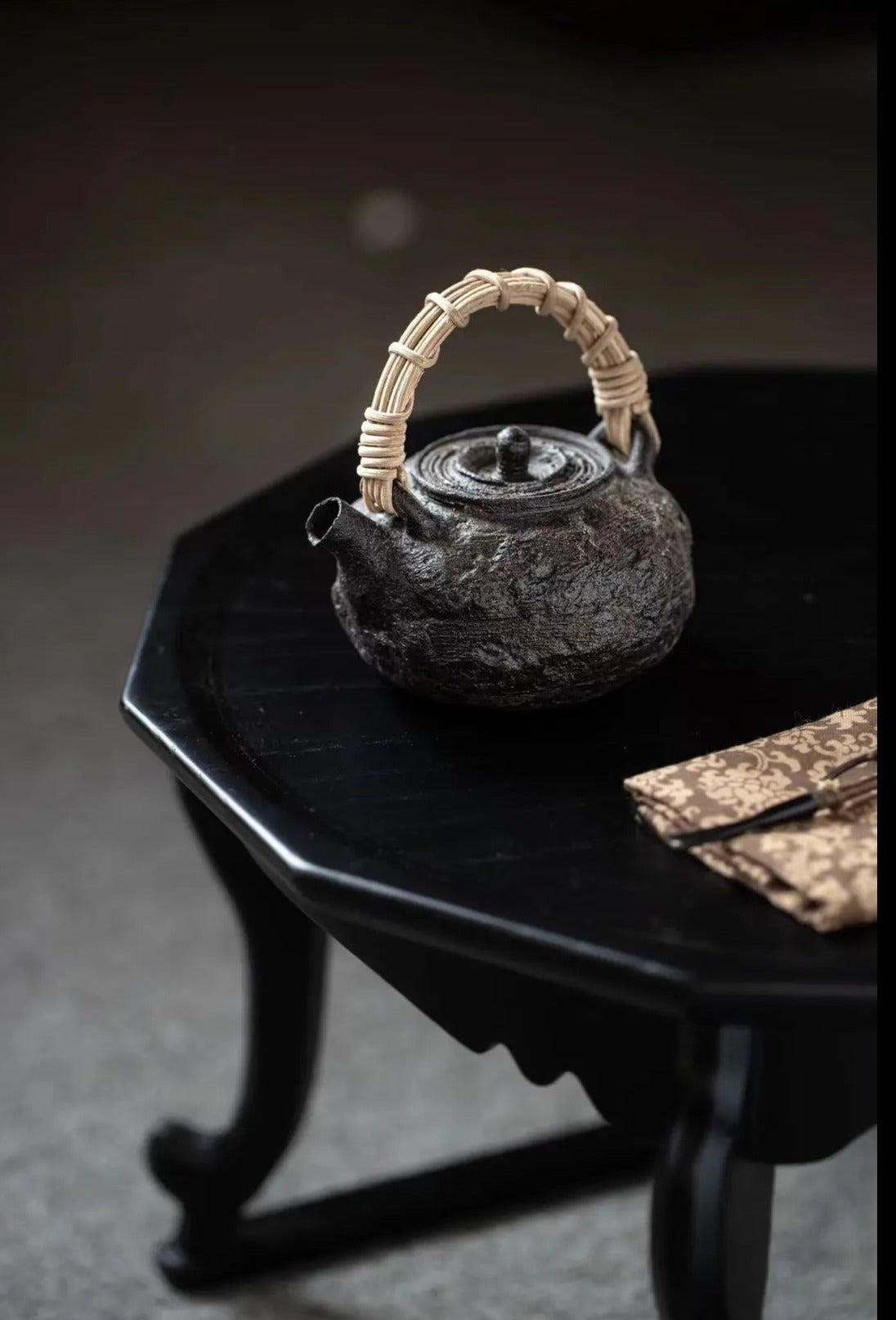 This is a pottery lifting handle kettle