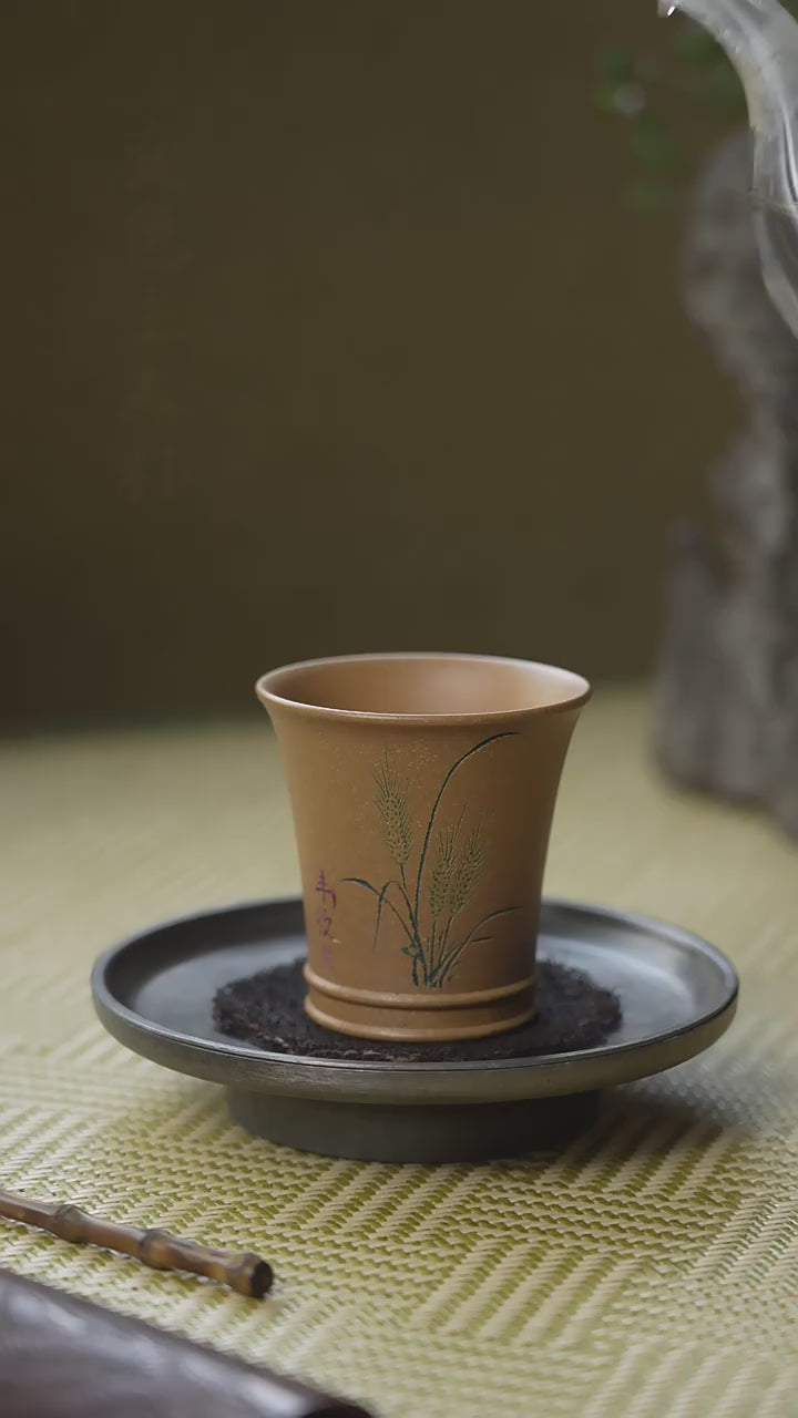 this is a Yixing teacup.this is Chinese Yixing clay teacup