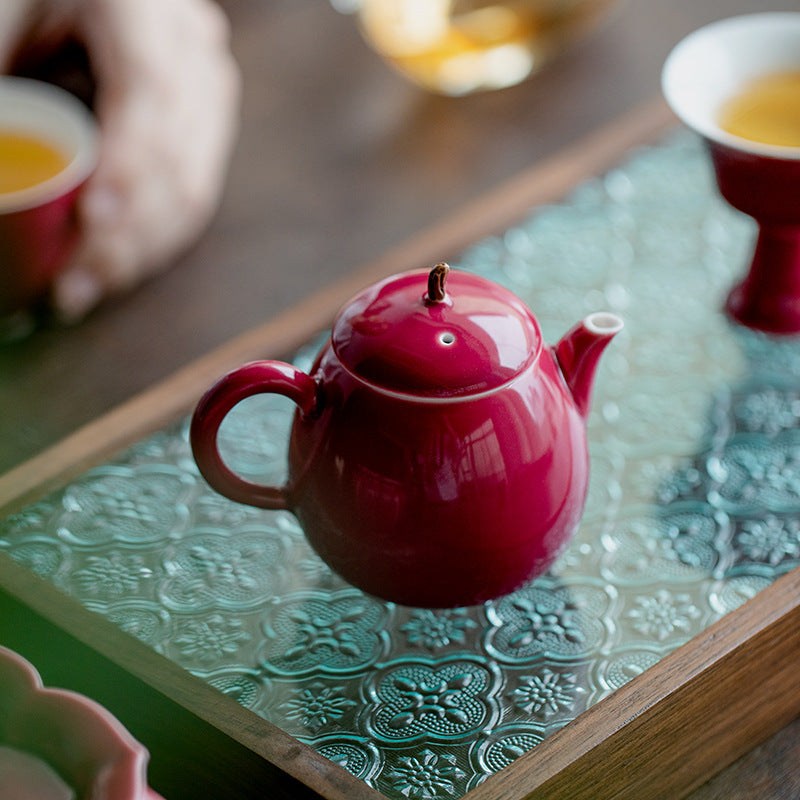 This is a ceramic teapot