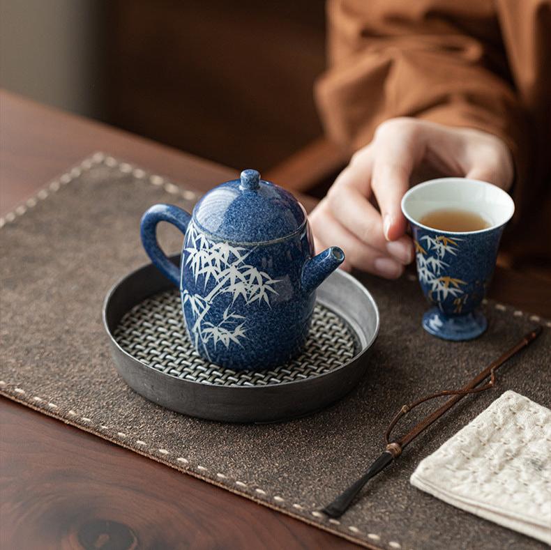 This is a ceramic teapot