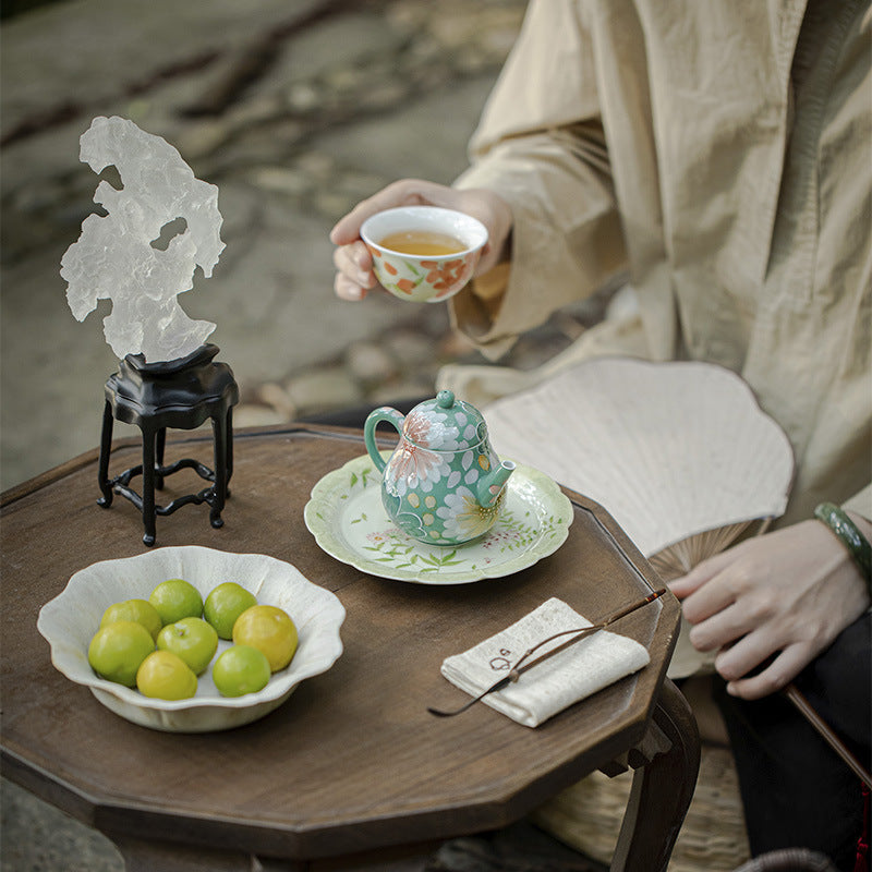 This is a ceramic teapot