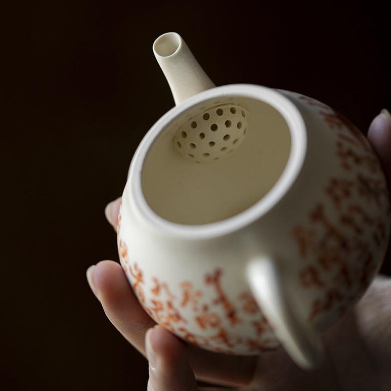 This is a soda glaze teapot