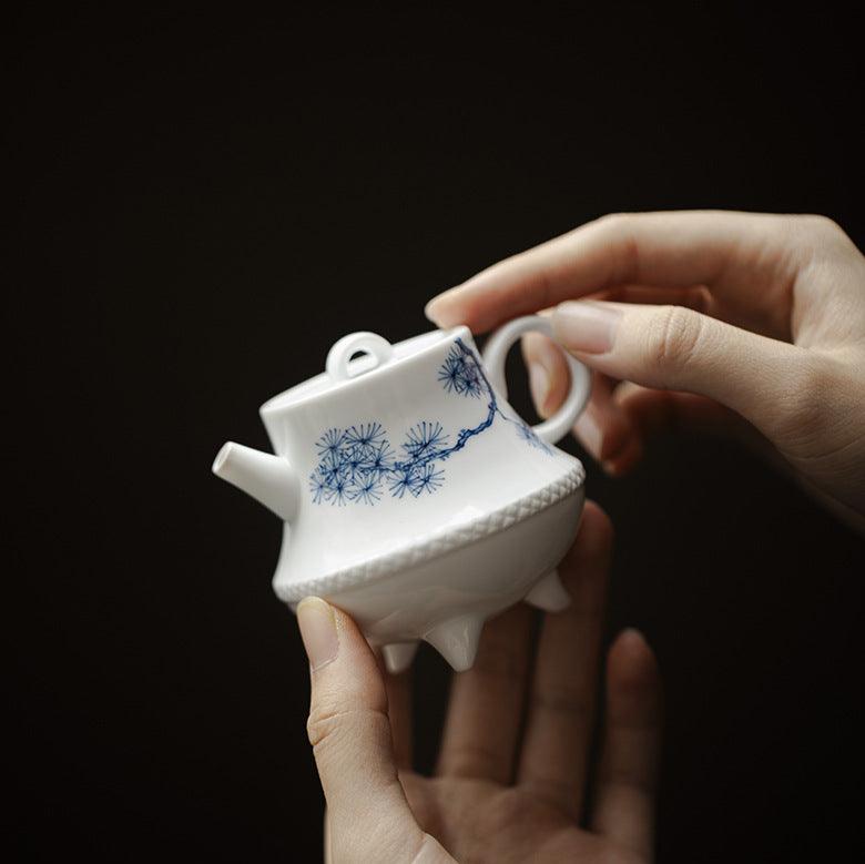 this is a ceramic teapot