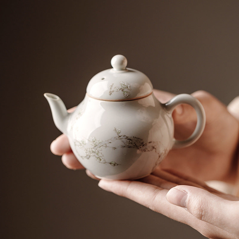 this is a ceramic teapot