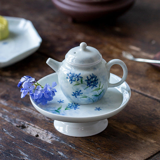 This is a ceramic teapot