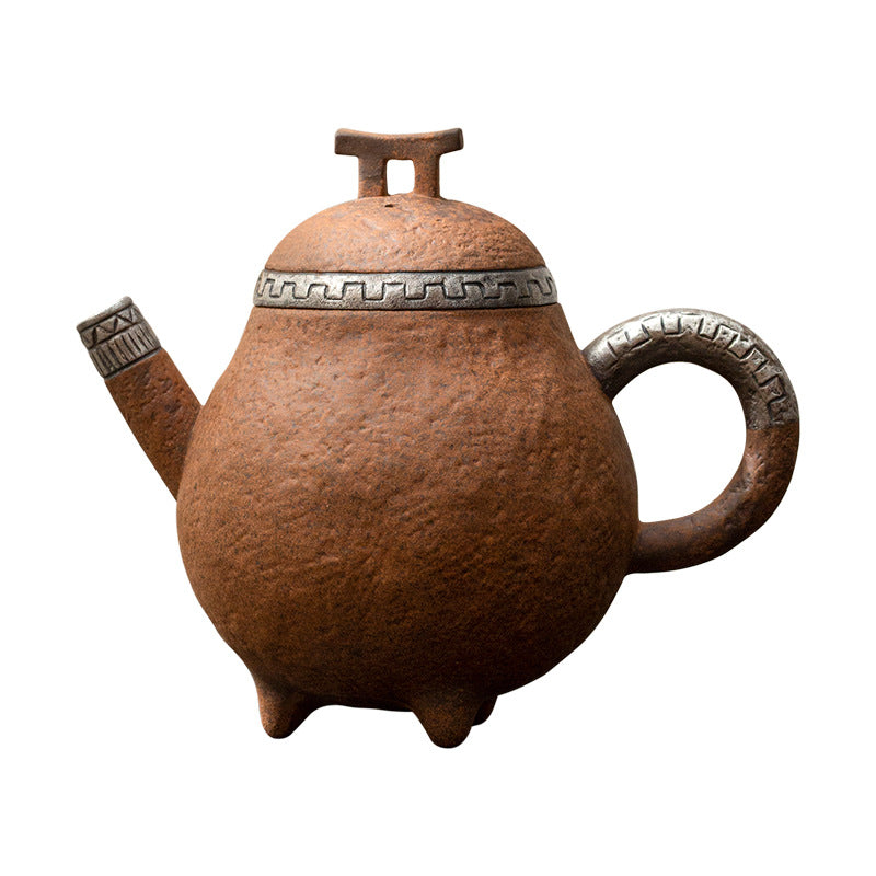 this is a pottery teapot. this is a pear teapot