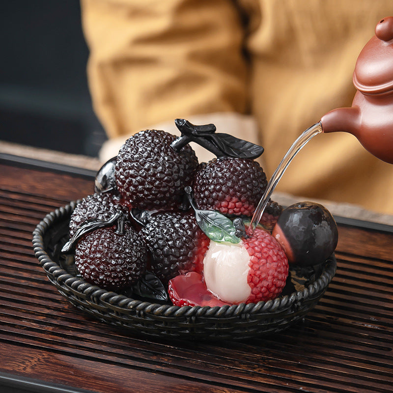 This is a color changing litchi lychee teapet.this is a resin teapet