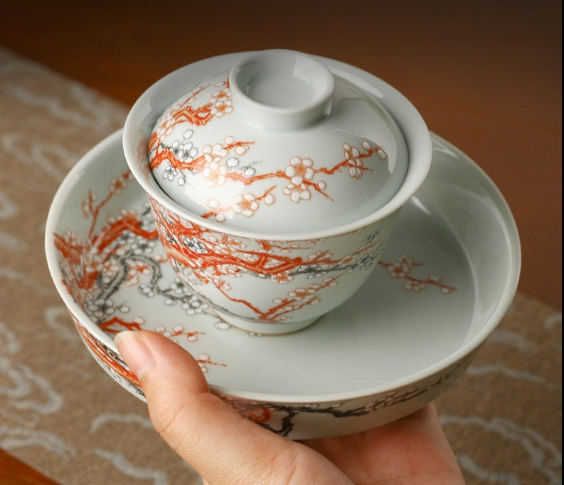 this is a Chinese Jingdezhen alum red plum flower teapot.this is a ceramic teapot gaiwan