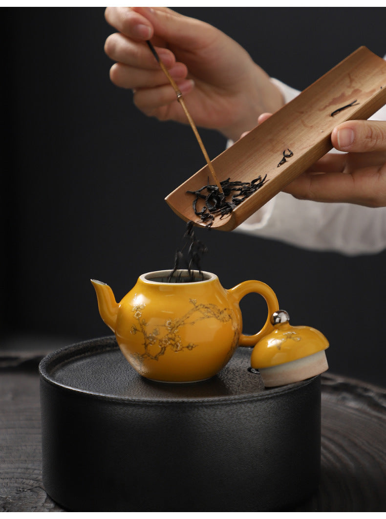 This is a ceramic teapot