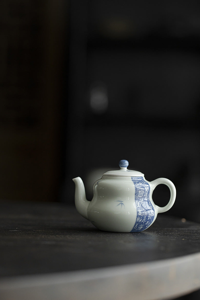 This is a ceramic teapot